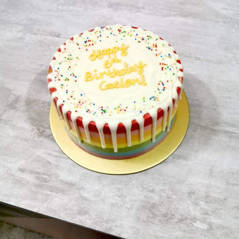 classic rainbow drip cake
